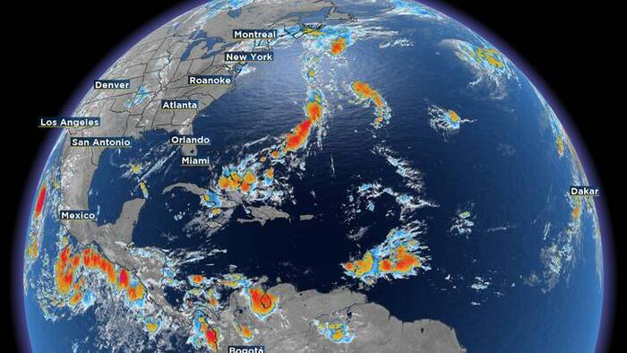 TD Fay continues to churn, new area of development turns away from U.S. Image